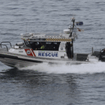 Marine Rescue NSW crews are pictured searching for missing surfer Darcy Deefholts near Wooli, Australia.