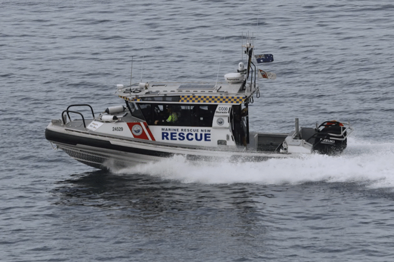 Marine Rescue NSW crews are pictured searching for missing surfer Darcy Deefholts near Wooli, Australia.